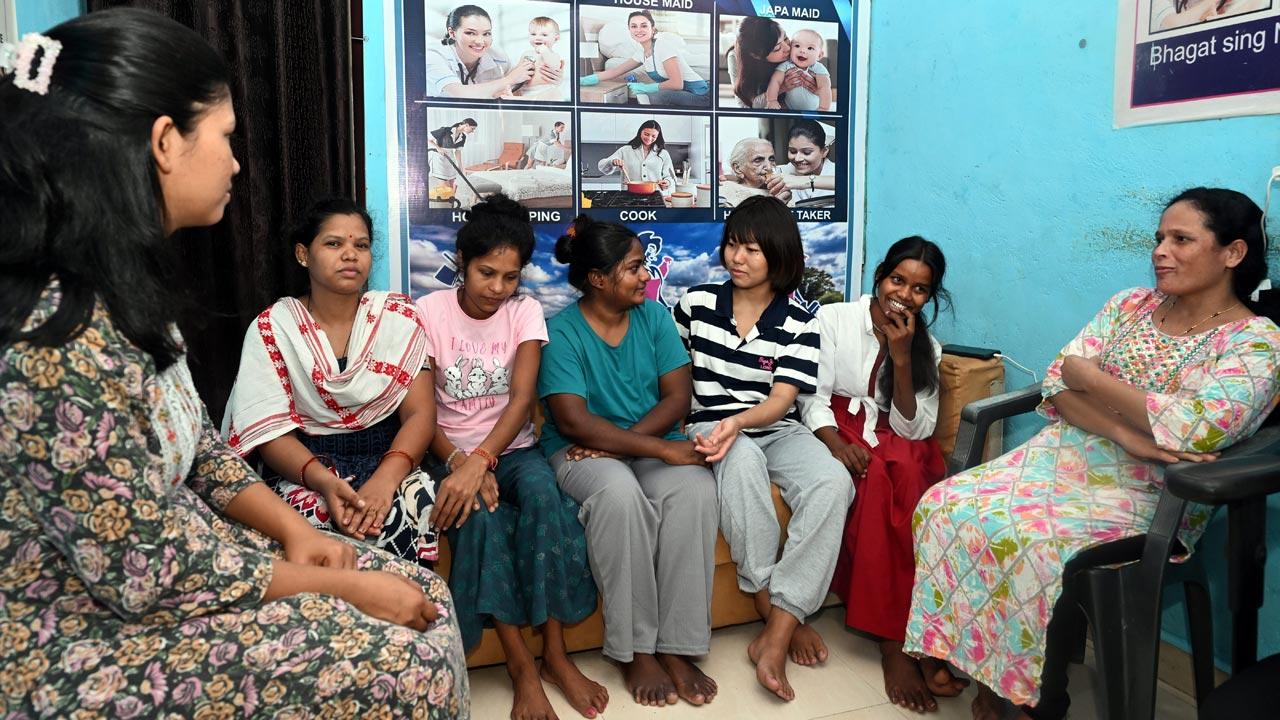 Nannies at Maids 24X7 Agency interact with each other at their office in Goregaon