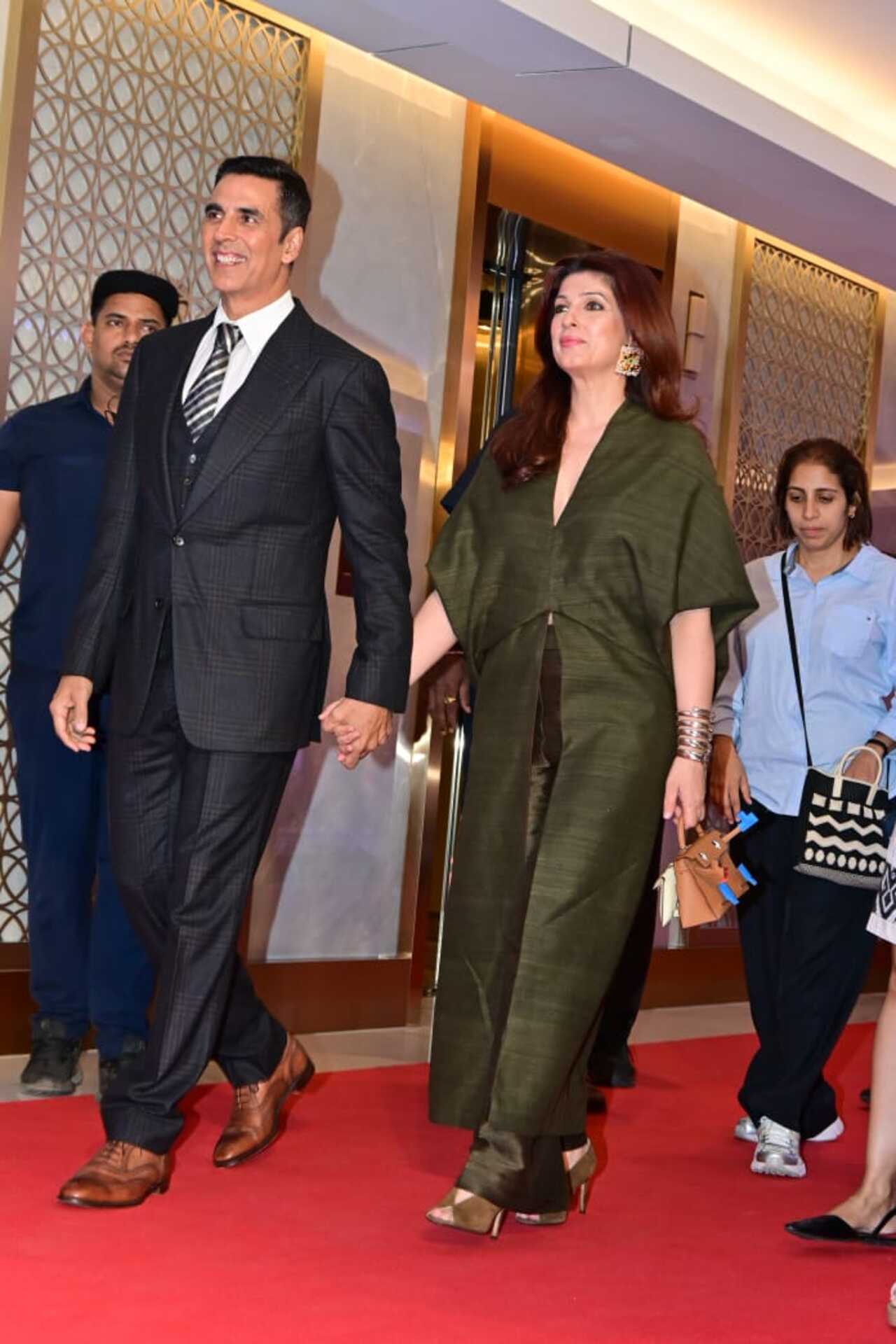 Akshay Kumar and Twinkle Khanna walked hand in hand as they arrived at the special screening of Kesari 2