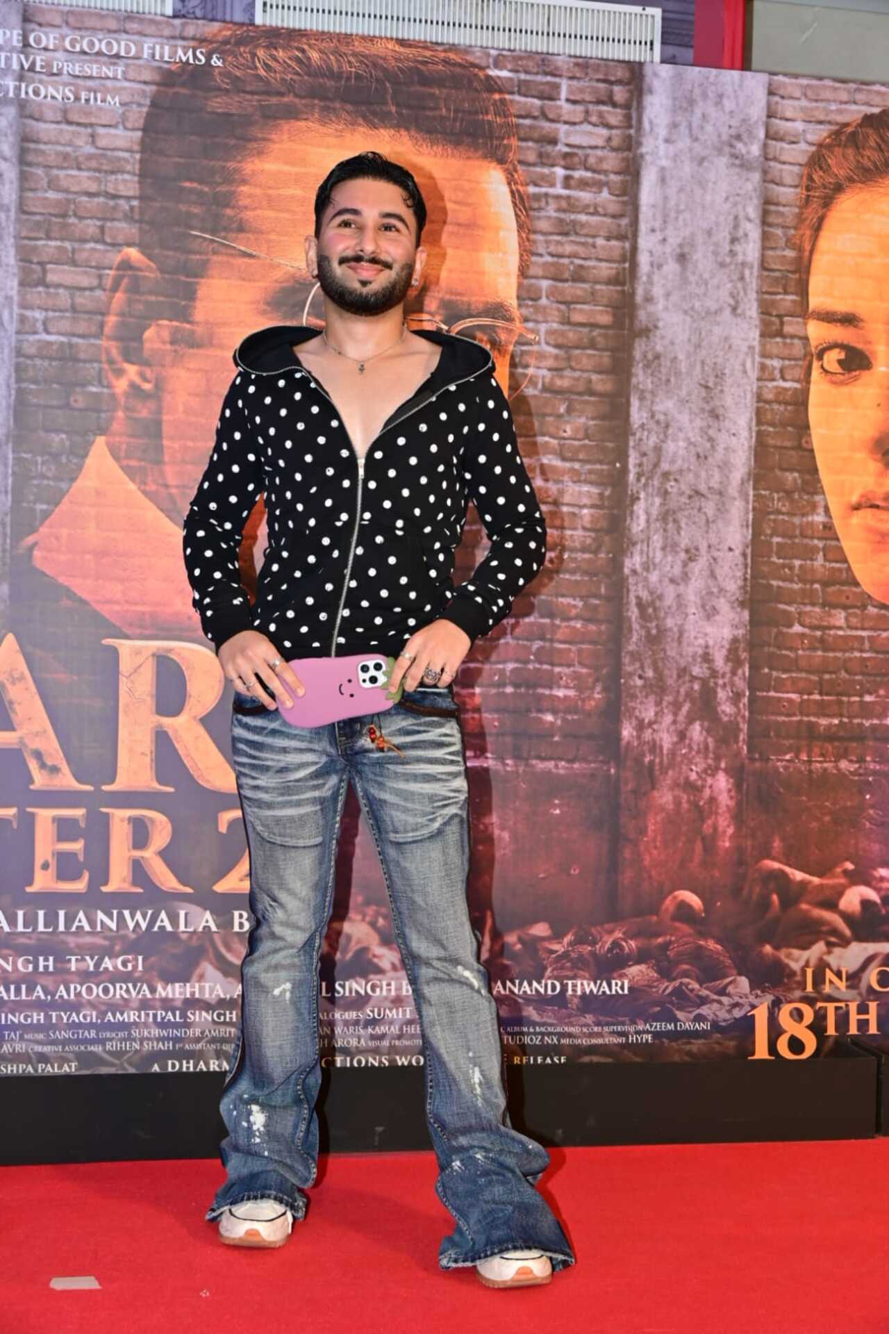 Orry posed for the media as he reached the special screening of Kesari 2