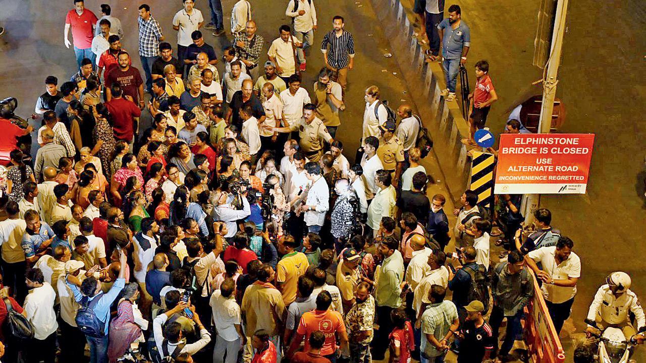Locals protesting against the closure of the bridge on Friday. File pic/Ashish Raje