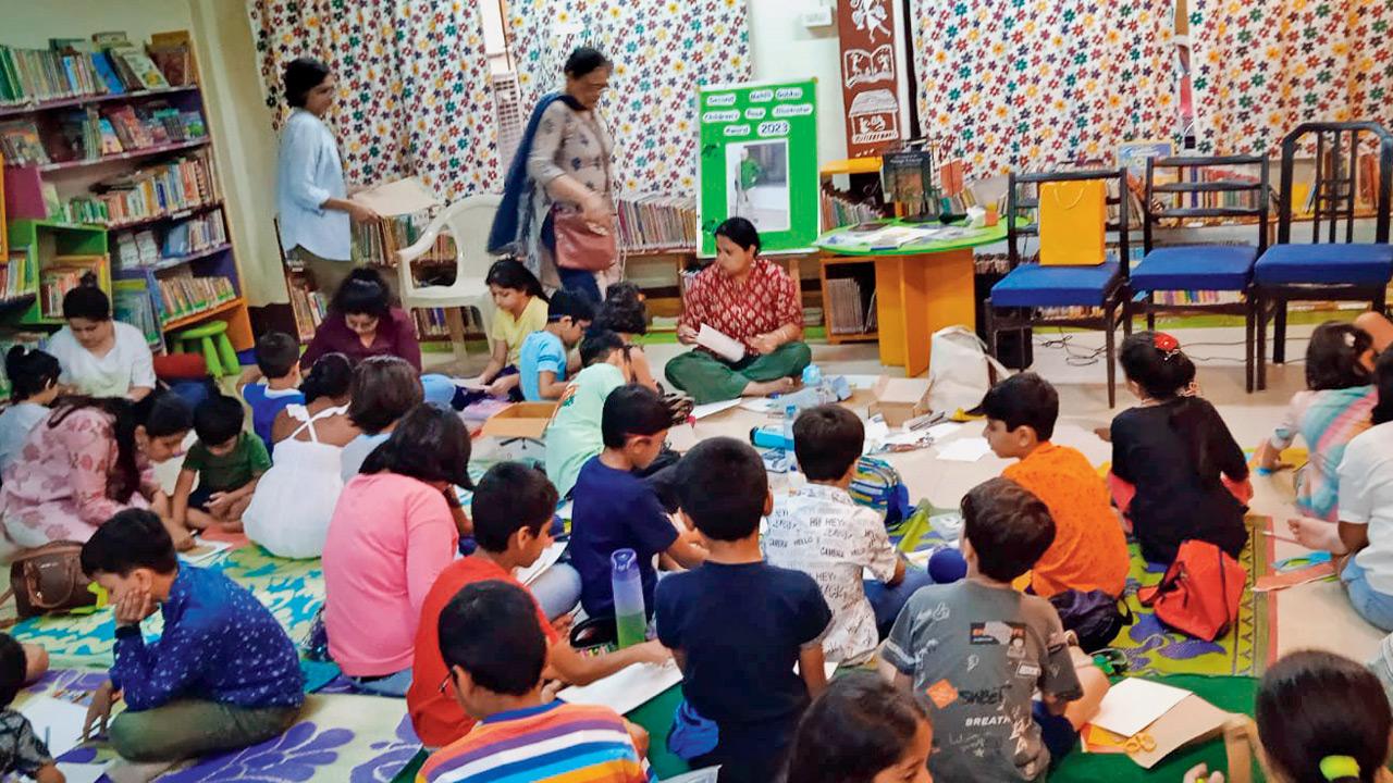 Children participate in a previous workshop at the library