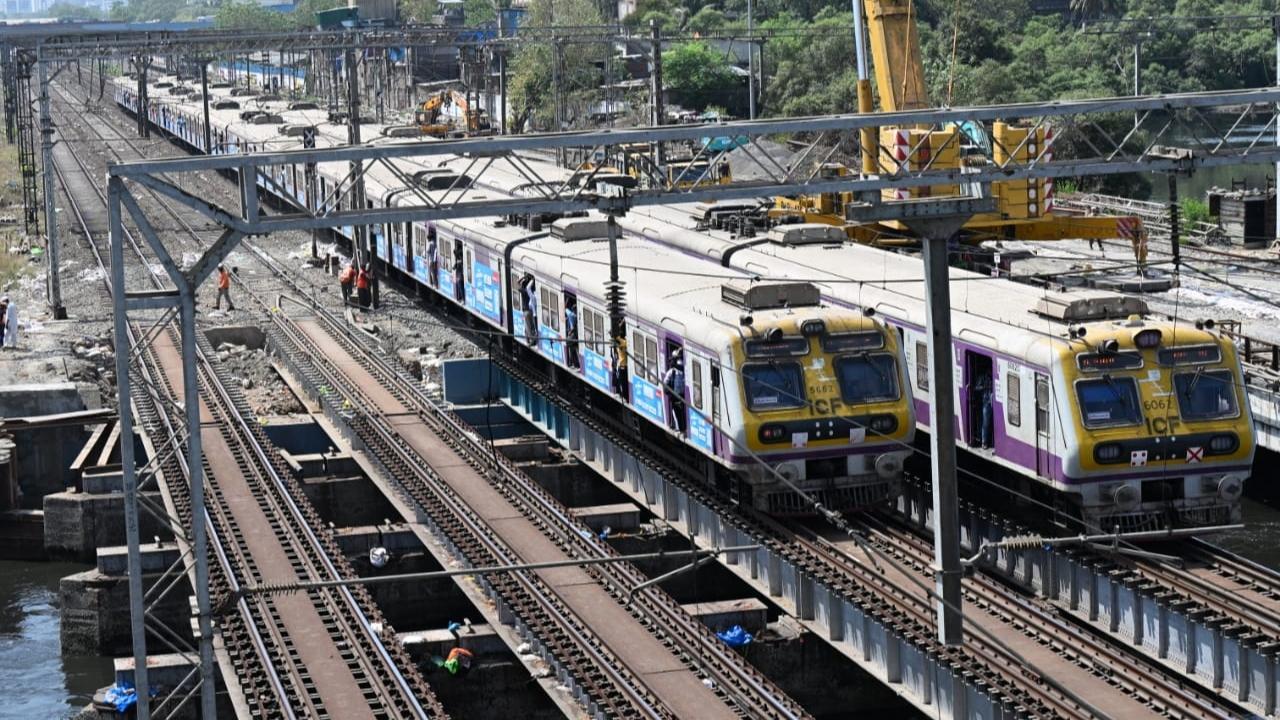 In Photos: Slow train movement amid bridge work between Mahim and Bandra