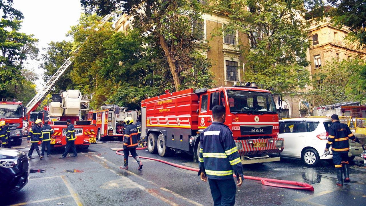 Firefighters at the ED office building in Ballard Estate. Pics/Shadab Khan