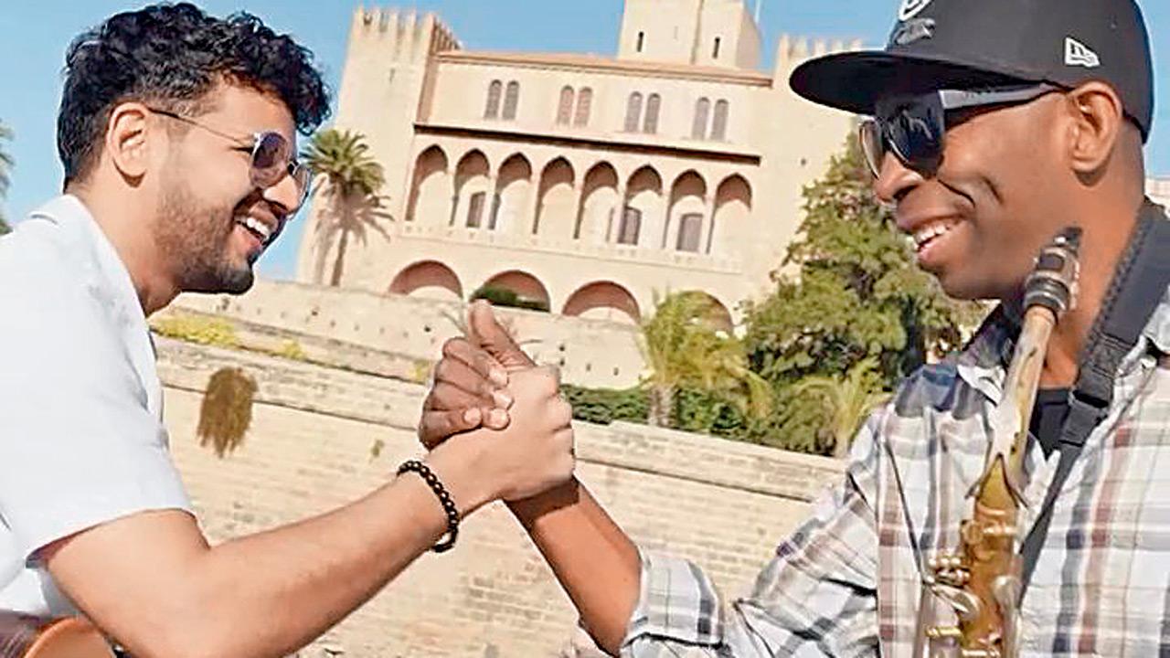 Mayur Jumani jams with a saxophonist on the streets of Spain. PIC COURTESY/MAYUR JUMANI ON INSTAGRAM