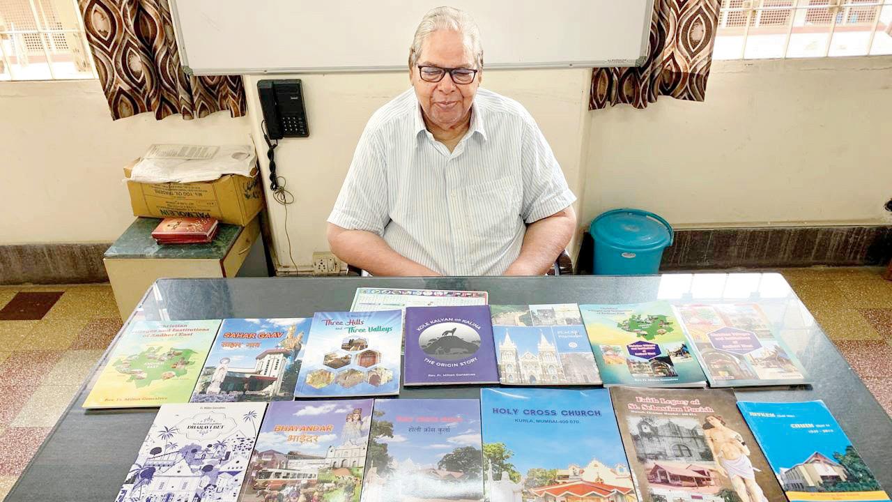 Fr Milton Gonsalves with his books, each chronicling a neighbourhood in Mumbai. PIC COURTESY/DEBASISH CHAKRAVERTY
