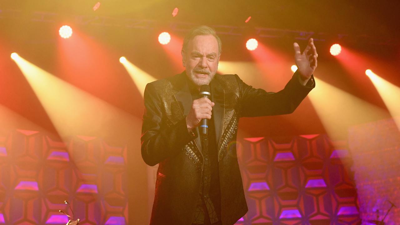 Neil Diamond In 2018, celebrated American singer-songwriter Neil Diamond announced that he would be retiring from touring because of his diagnosis of Parkinson’s Disease. It was after he cancelled the third leg of his 50th anniversary tour
