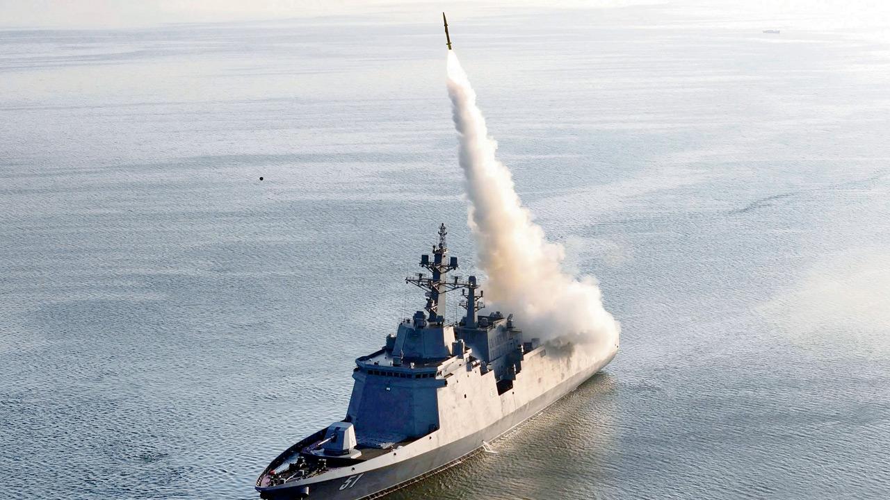 Destroyer Choe Hyon test-fires a missile. PIC/AFP