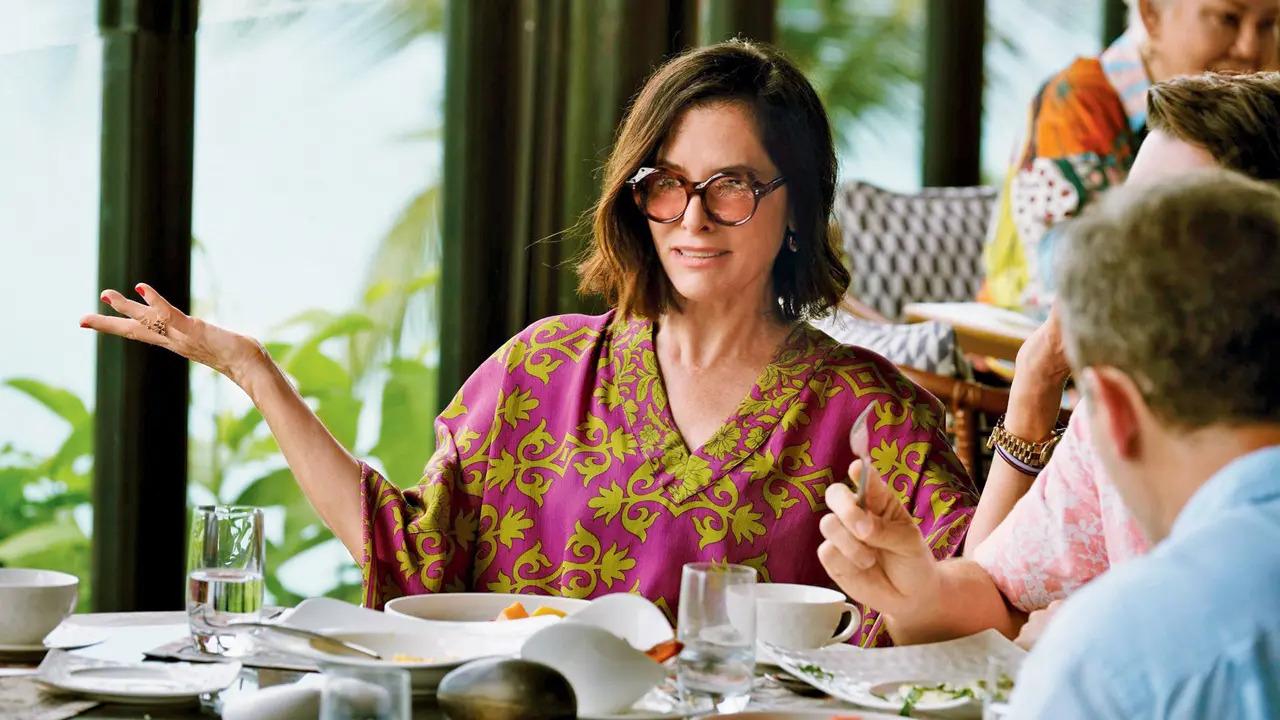 Breezy kaftans in rich jewel tones
This year, invest in silk kimono-style pieces in rich jewel tones. Statement prints, which were favoured by New York City lawyer Laurie (played by Carrie Coon), are trending again and mimic the vibrancy of tropical beach settings. Fashion and luxury entrepreneur Meghna Ghodawat says that one can easily dress these pieces up with statement jewellery, or tone them down by skipping all accessories. Steer clear of designs that have too many embellishments and, if you are petite, floor-length styles that can overwhelm you.