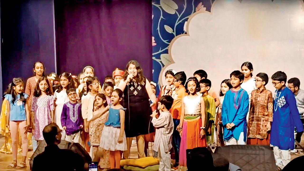 Shyama Panikkar (centre) performs with her students