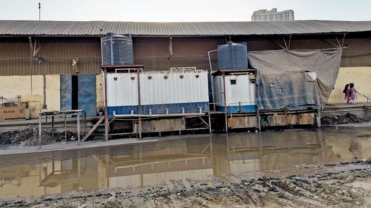 Mumbai: Commuters wade through toilet water to reach Ram Mandir station