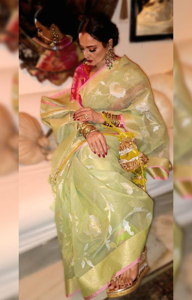 Rekha looked ethereal in a handwoven Banarasi silk saree from his label