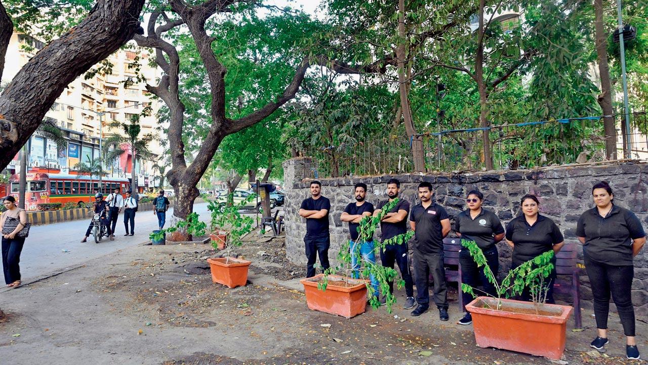 A group of bouncers ensure a pavement outside Panchsheel Heights in Kandivli’s Mahavir Nagar is completely free of encroachers on April 4