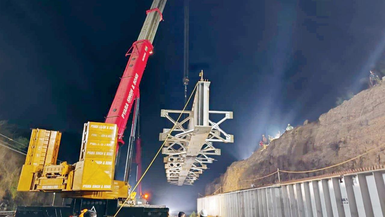 The Mumbai Railway Vikas Corporation launches girders of the Morbe dam road overbridge early on Friday morning