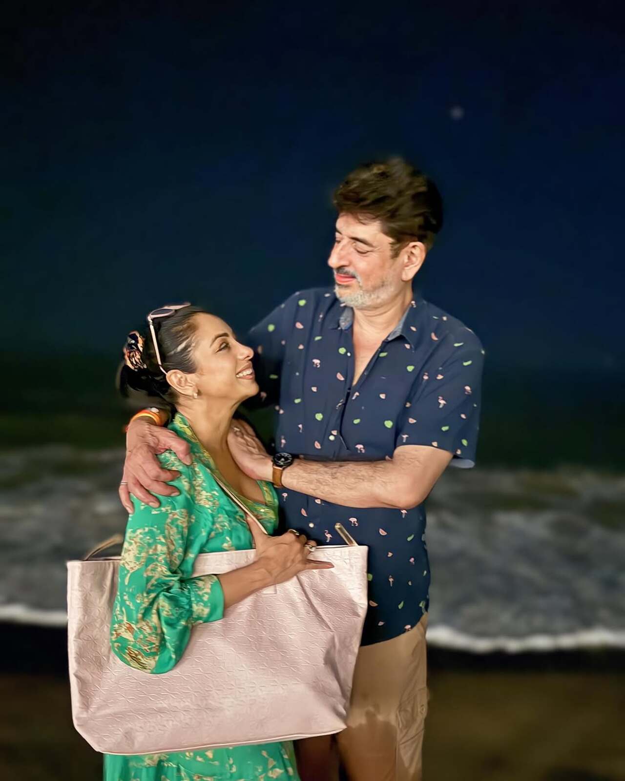 Couple Goals! In this picture, Ashwin looks at Rupali with love as they pose in front of a beautiful background