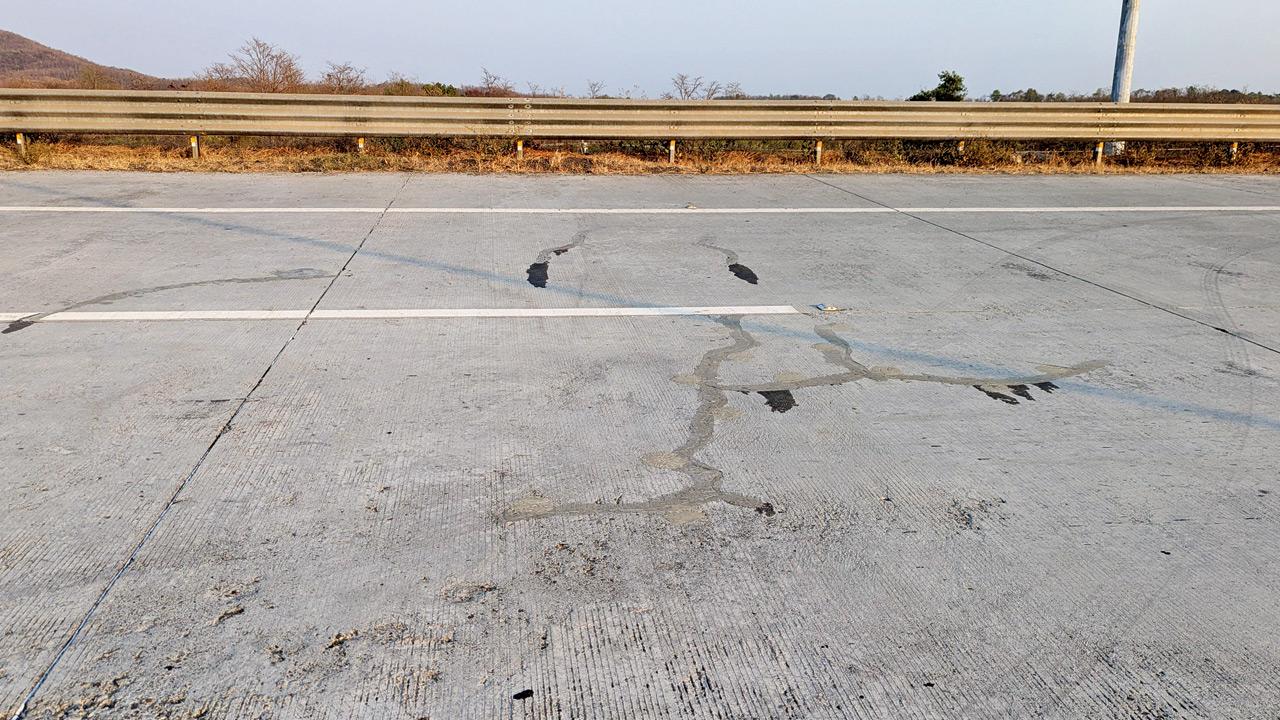 Cracks on the surface of an unopened section of the Samruddhi Mahamarg