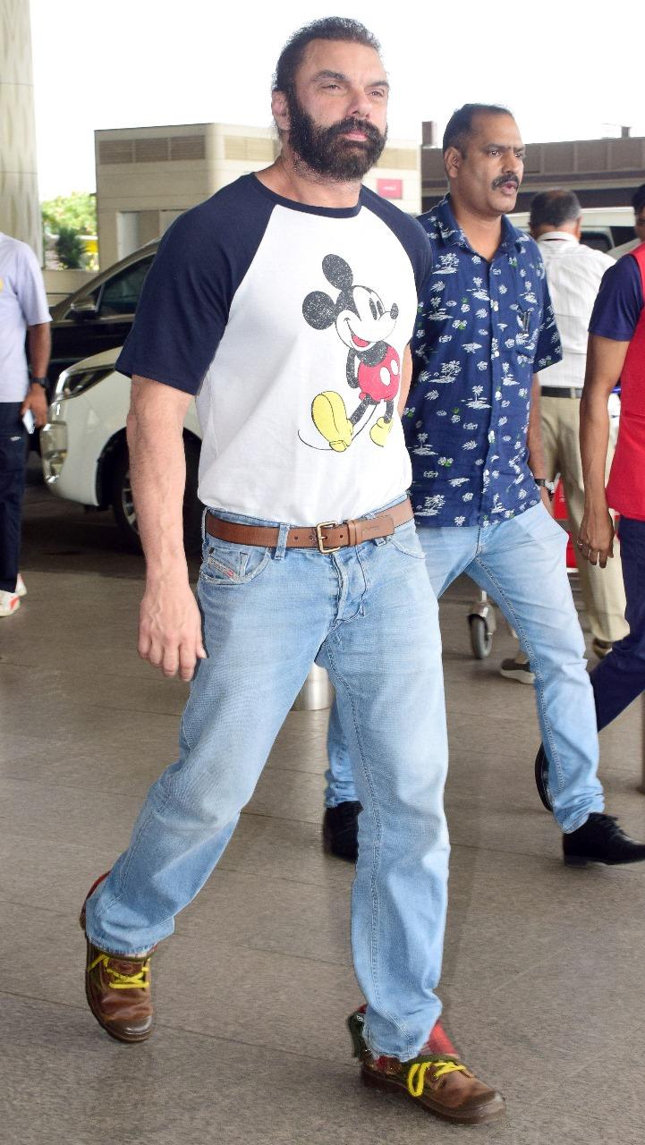 Sohail Khan jetted off from the city. The actor kept his airport look simple as he wore a T-shirt featuring Mickey Mouse printed on it and blue jeans