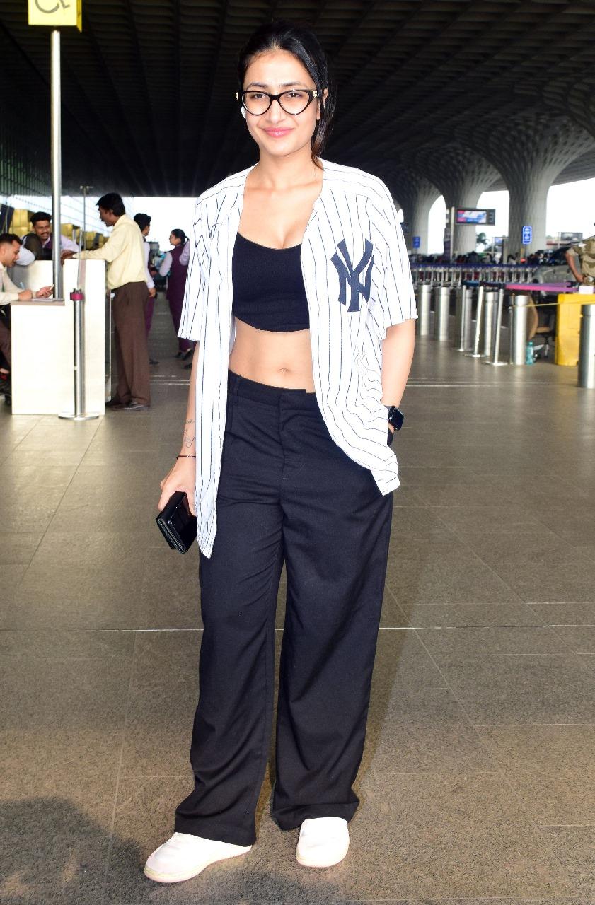 Dhanashree was snapped at Mumbai airport as she jetted off from the city