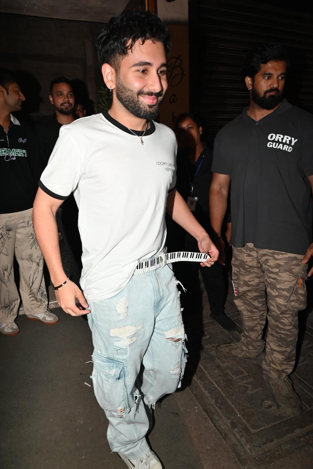 Social media influencer Orry looked cute in a simple white T-shirt and ripped jeans as he was clicked outside the famous restaurant Bastian last night