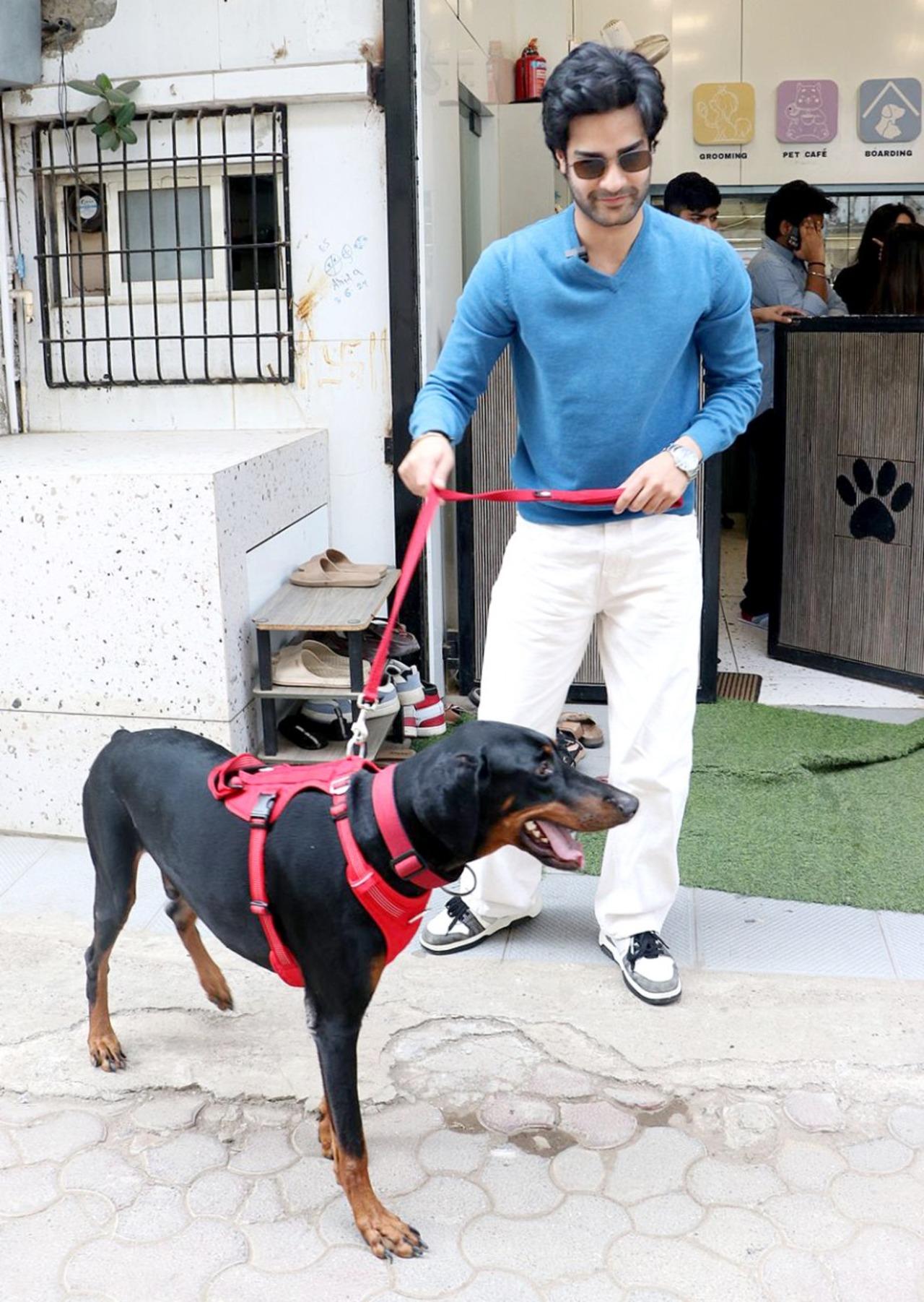 Aaman Devgn took his furry friend on a walk this morning. The Azaad star looked smart in a blue T-shirt paired with loose white pants