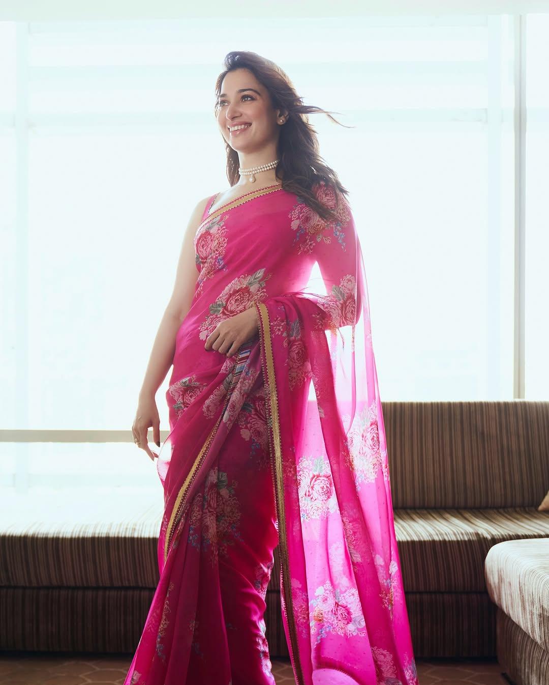 Pretty in pink, Tamannaah wore a beautiful printed floral saree that is just perfect for a simple puja look