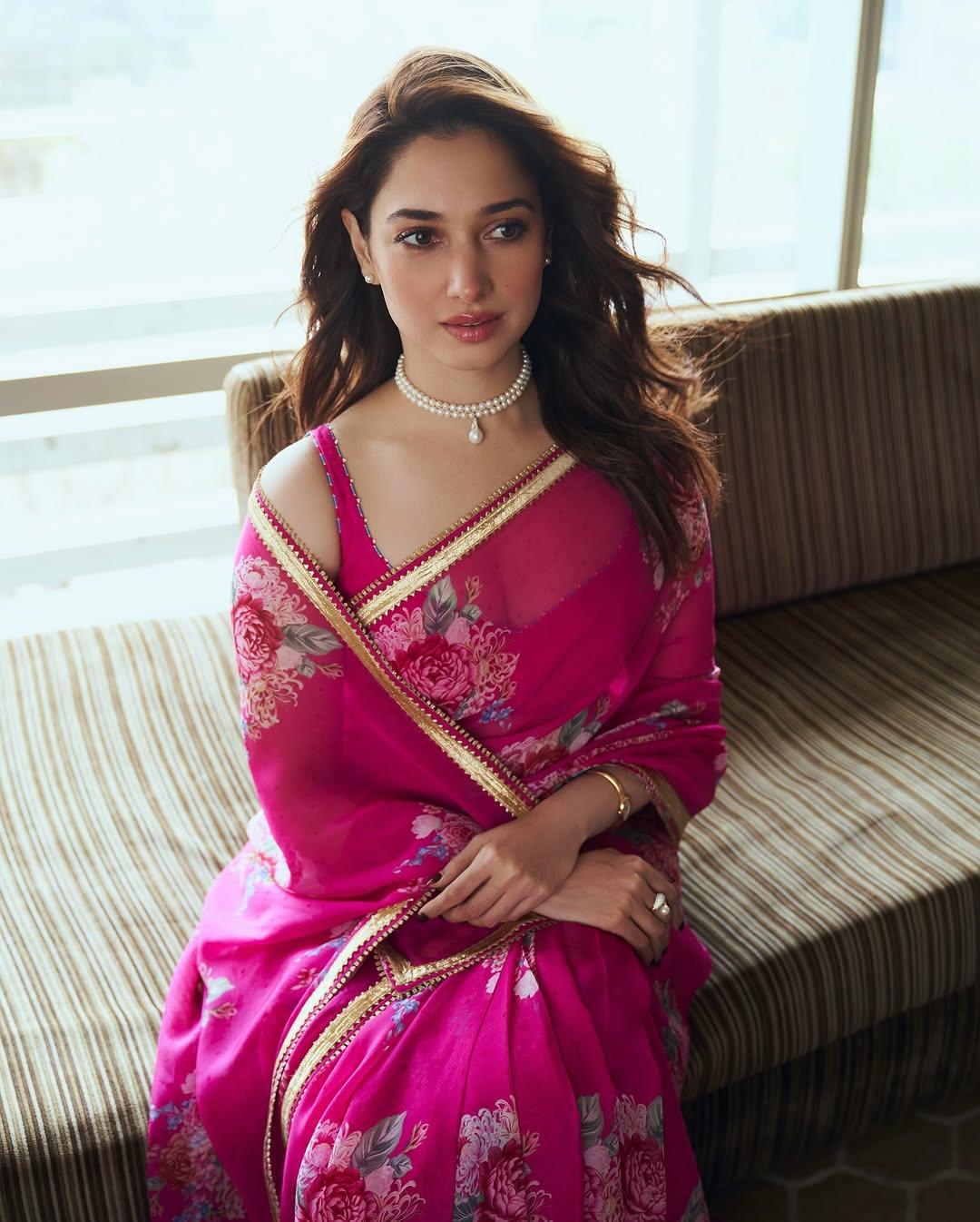 The actress paired her saree with a matching strappy blouse and wore stylish pearl jewellery with it