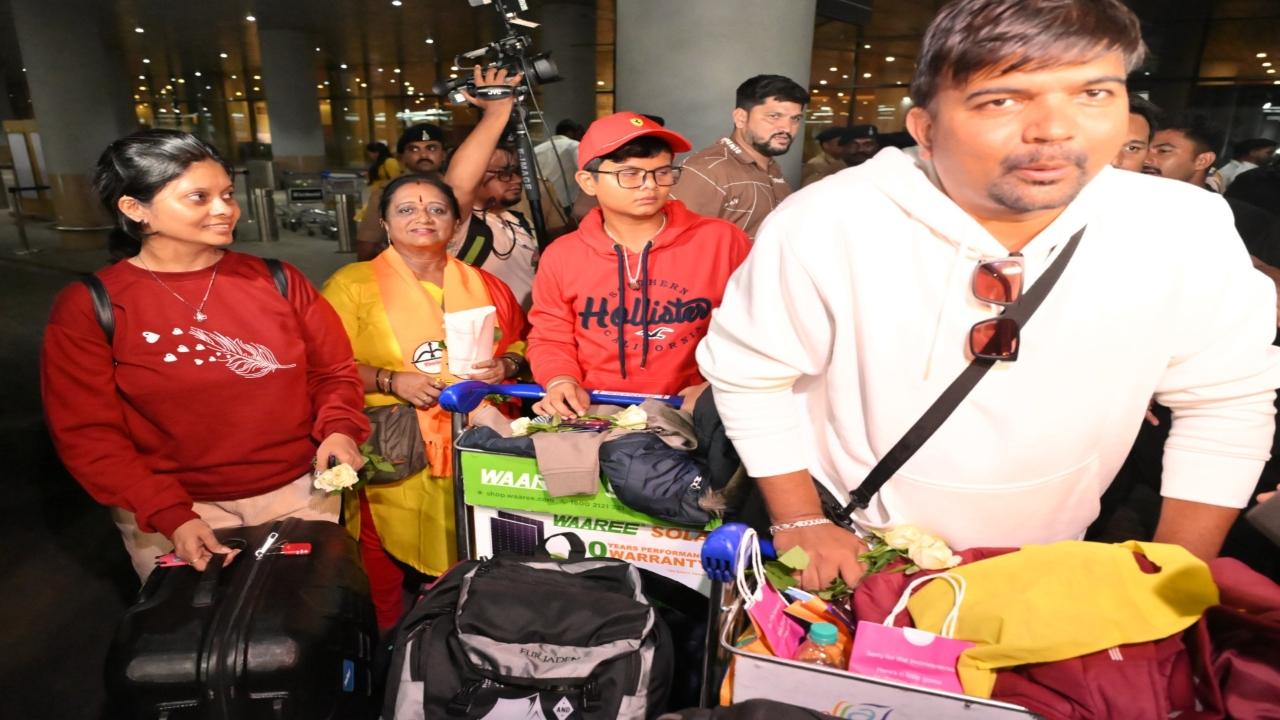 Rakesh Jadhav (right), his wife Sayee (left), and their son Aaradhya were among those who returned on Thursday