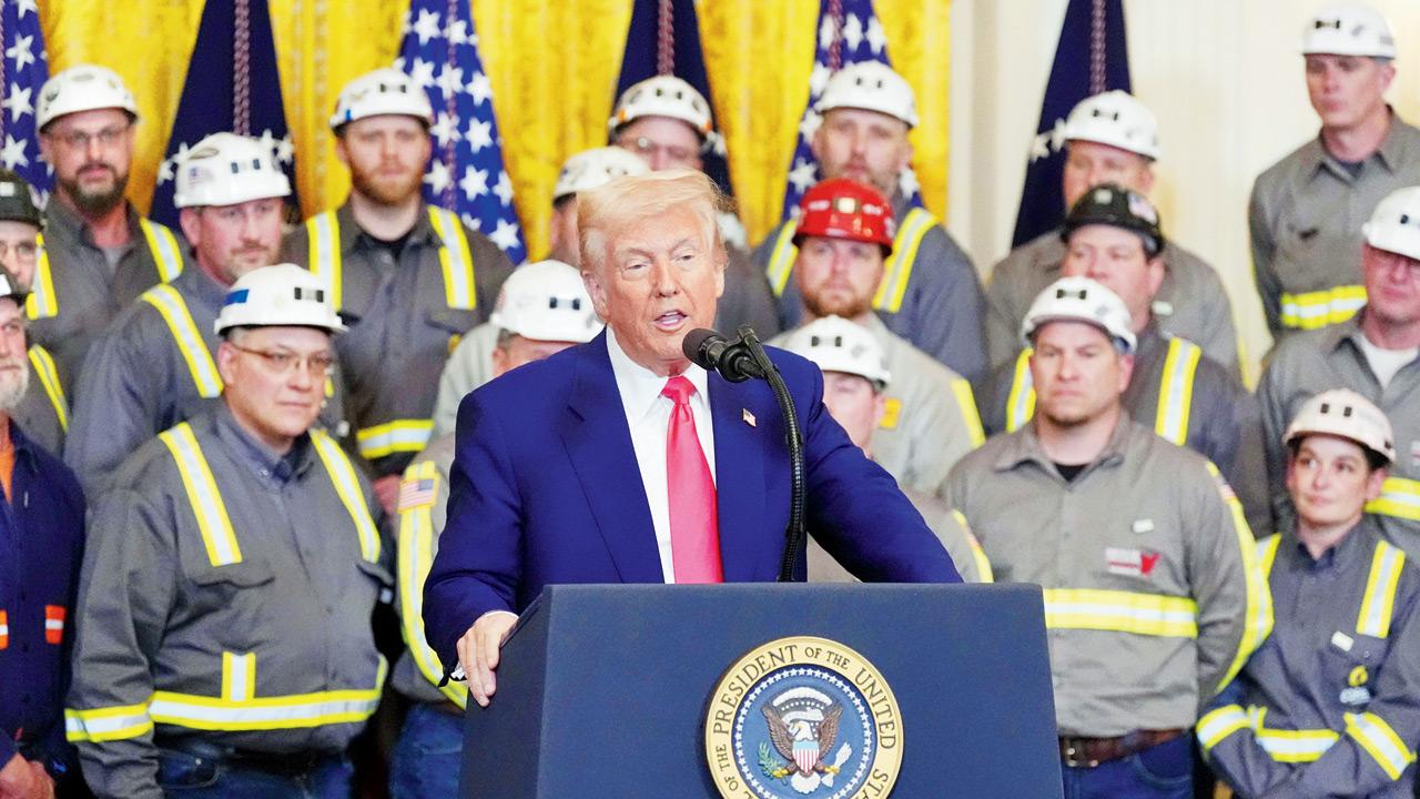 US President Trump speaks during an executive order signing event in the East Room of the White House. PIC/AFP 