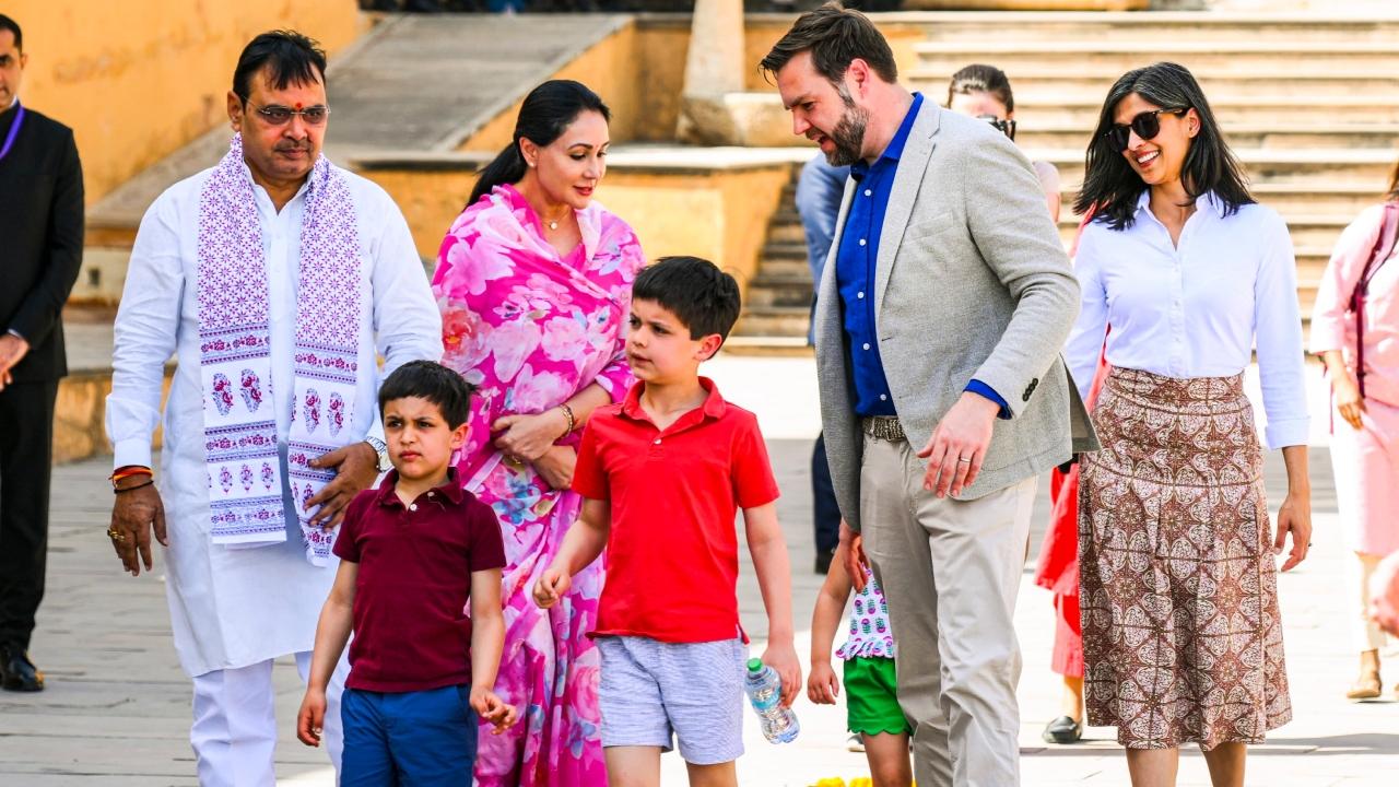 While Vice President Vance walked the red carpet holding his sons, Ewan and Vivek, by the hand, his wife carried their daughter Mirabel. The family appeared captivated by the impressive courtyard and architecture, officials said