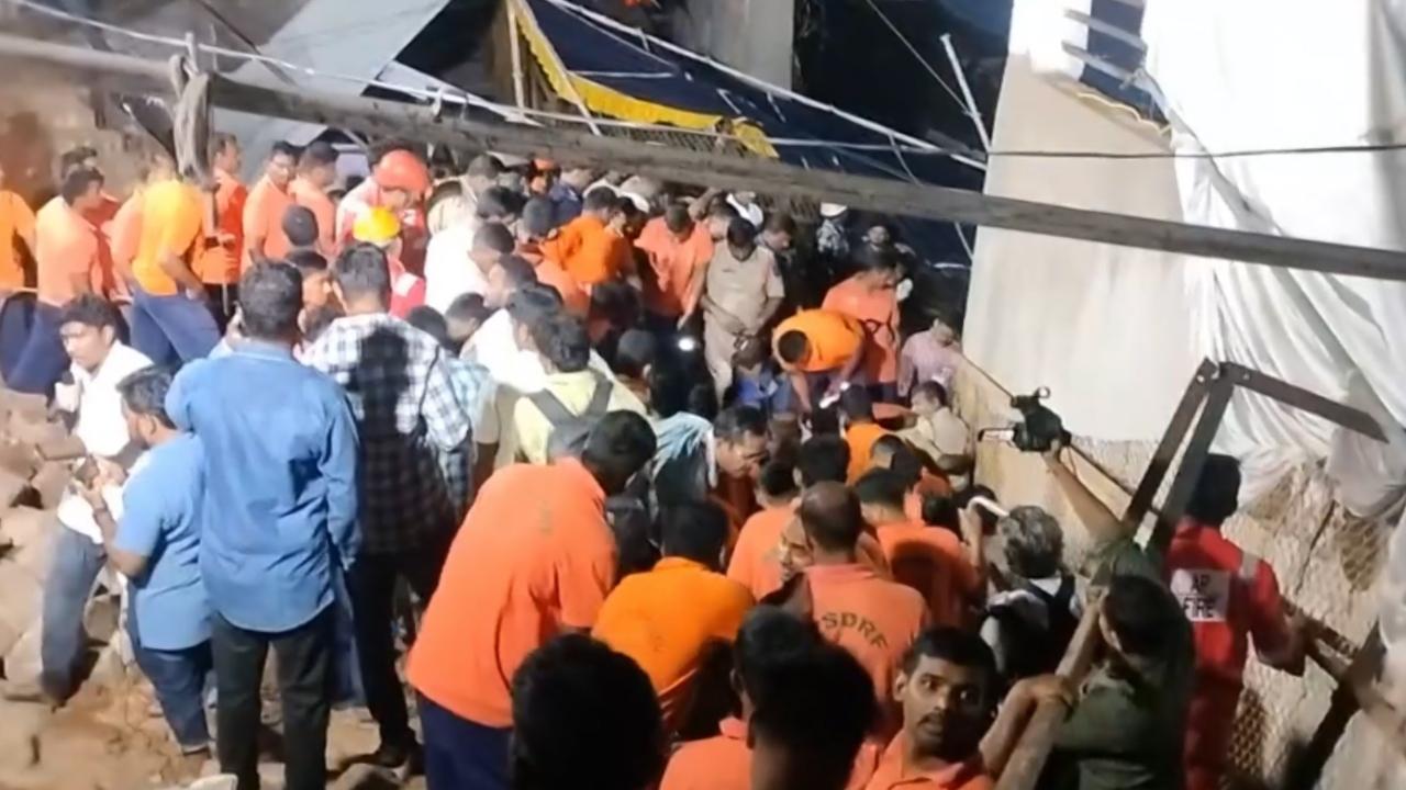 State Home Minister V Anitha, who was present at the site, said preliminary reports indicated that the wall collapse at the temple was triggered by soil loosening due to heavy rains in the area. According to government sources, one person sustained injuries
