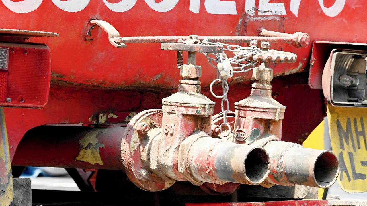 A chained water tanker in Andheri East yesterday. Pics/Ashish Raje