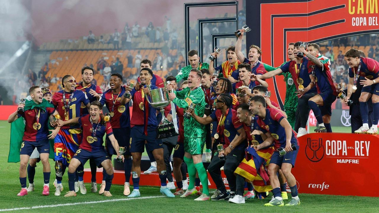 Barcelona edge Real Madrid in extra-time to win wild Copa del Rey final