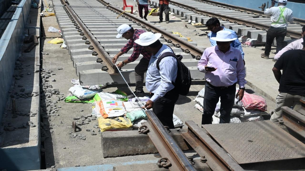 WR officials inspect the work near Kandivali station on Sunday afternoon