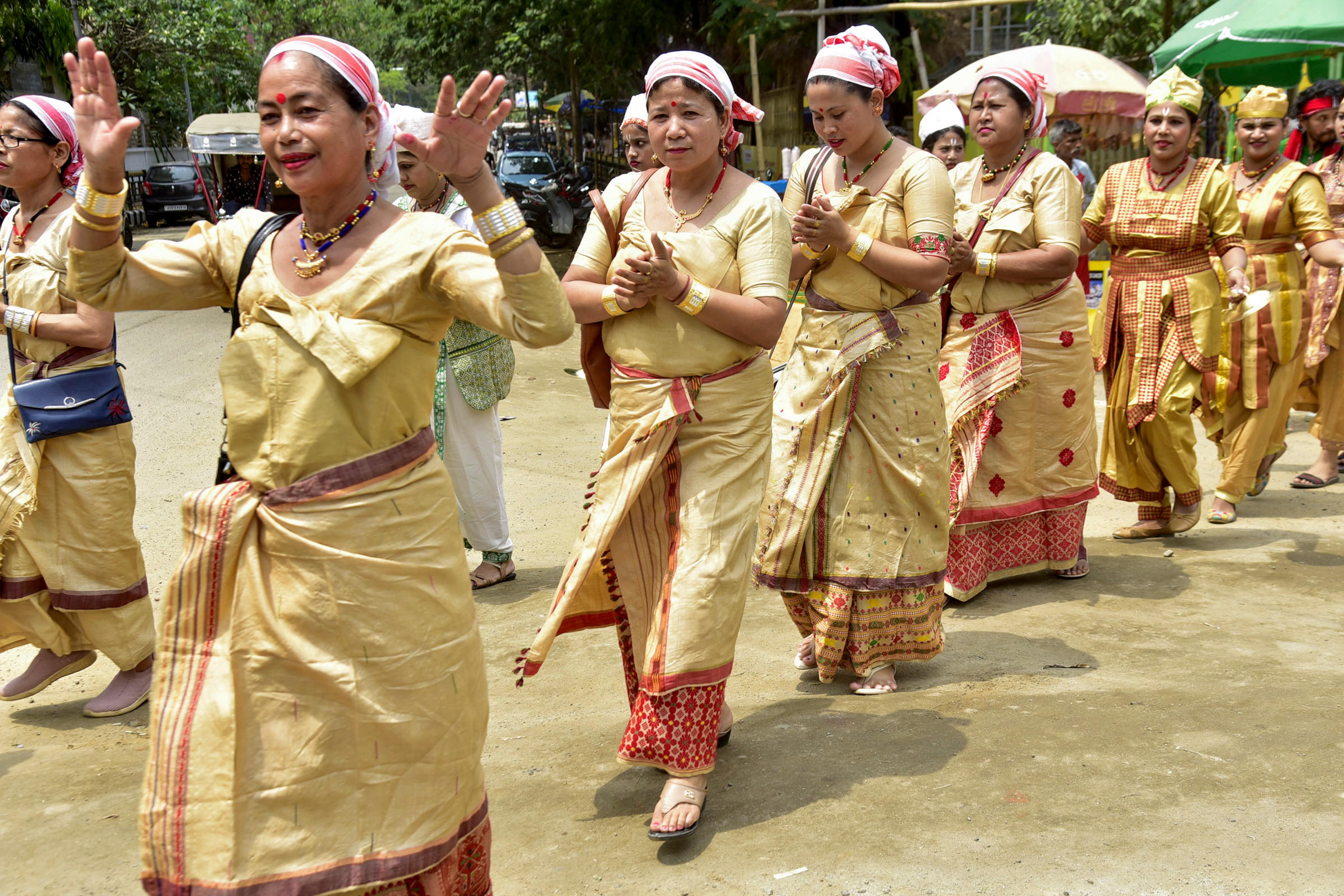 A cultural troupe participates in Rongali Bihu celebrations, in Guwahati today (PTI Photo)