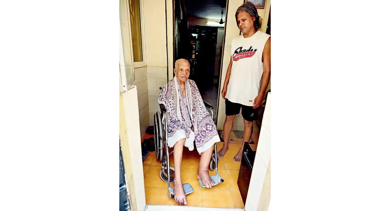 Robert Sequeira, 93, has been homebound for over two months due to inaccessible roads in Bandra West. Pic/ Sjadab Khan
