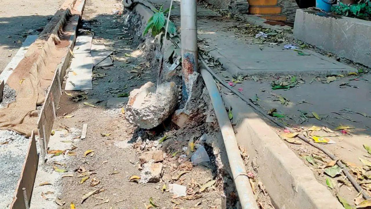 Footpaths and roads in Yogi Hills, Mulund, have been dug up, putting schoolchildren and seniors at risk. Pic/ Bharat Soni
