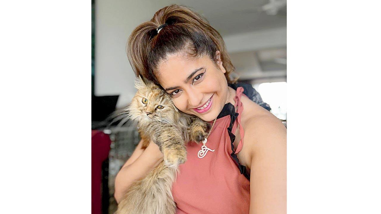 Tej Malkani and her cat Mimi