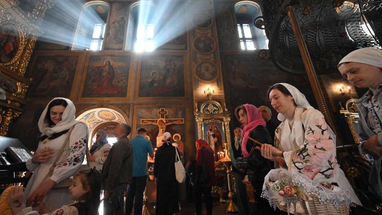 Orthodox worshippers attend the Easter service at Saint Michael's Golden-Domed Cathedral in Kyiv on Sunday, even as the Russian invasion of Ukraine continued