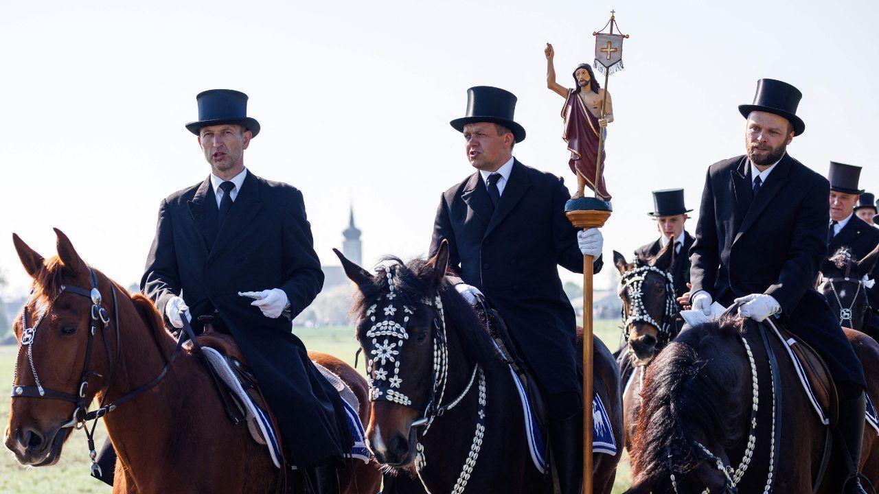 In Ralbitz-Rosenthal, eastern Germany, Sorbian horsemen dressed in traditional black attire ride decorated horses and sing during the Sorbian Easter horseback procession, an ancient religious ritual