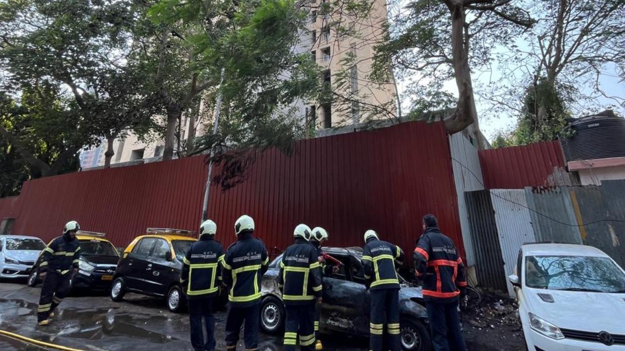 Fire breaks out in car parked near Adarsh Housing Society in Cuff Parade
