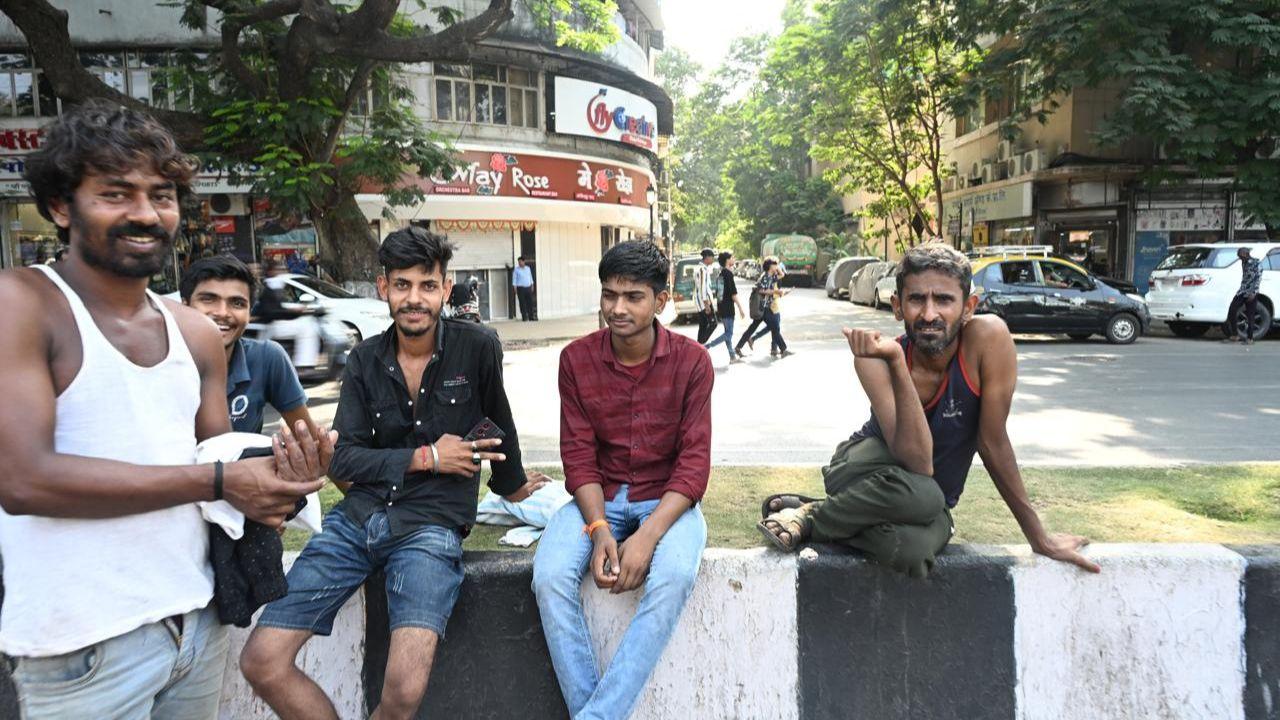 Water tankers drivers wait outside the filling station at Metro Talkies in Dhobi Talav in Mumbai 