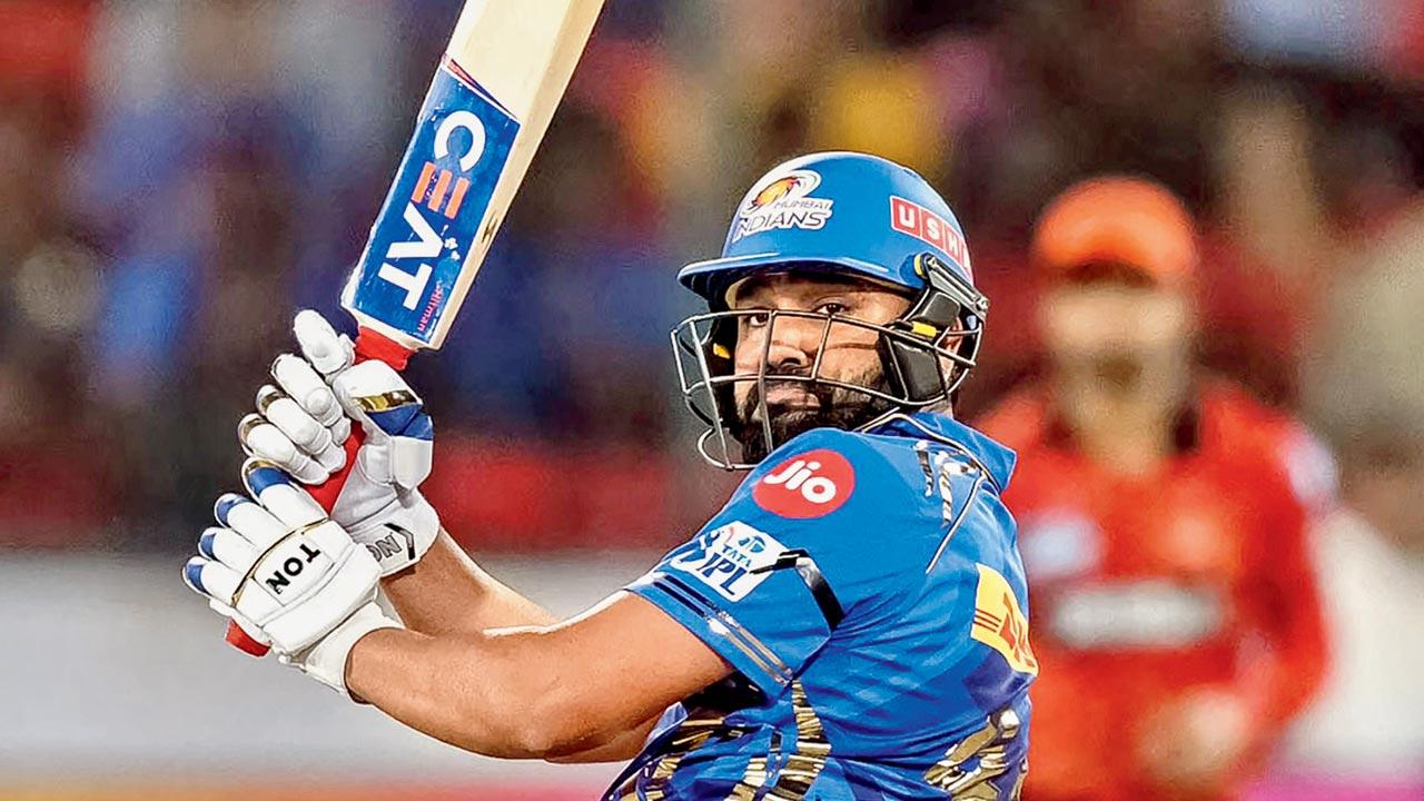 MI opener Rohit Sharma en route  his 70 vs SRH on Wednesday. Pic/AFP