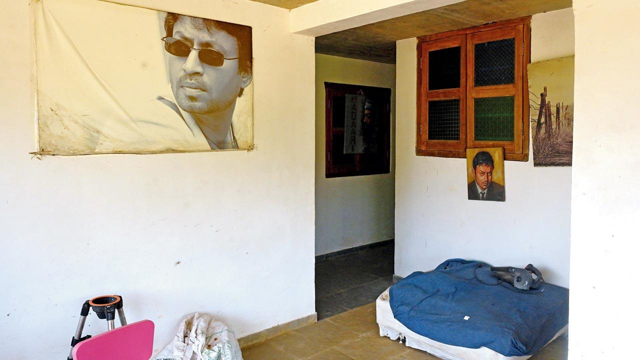 A seating area with actor Irrfan’s portraits near the entrance to his farmhouse in Hiruchiwadi village, Igatpuri. The farmhouse’s gates have no locks. Some of Irrfan’s belongings, such as an award he won, and other décor items lie in the open. However, nobody touches his belongings. Pic/Satej Shinde