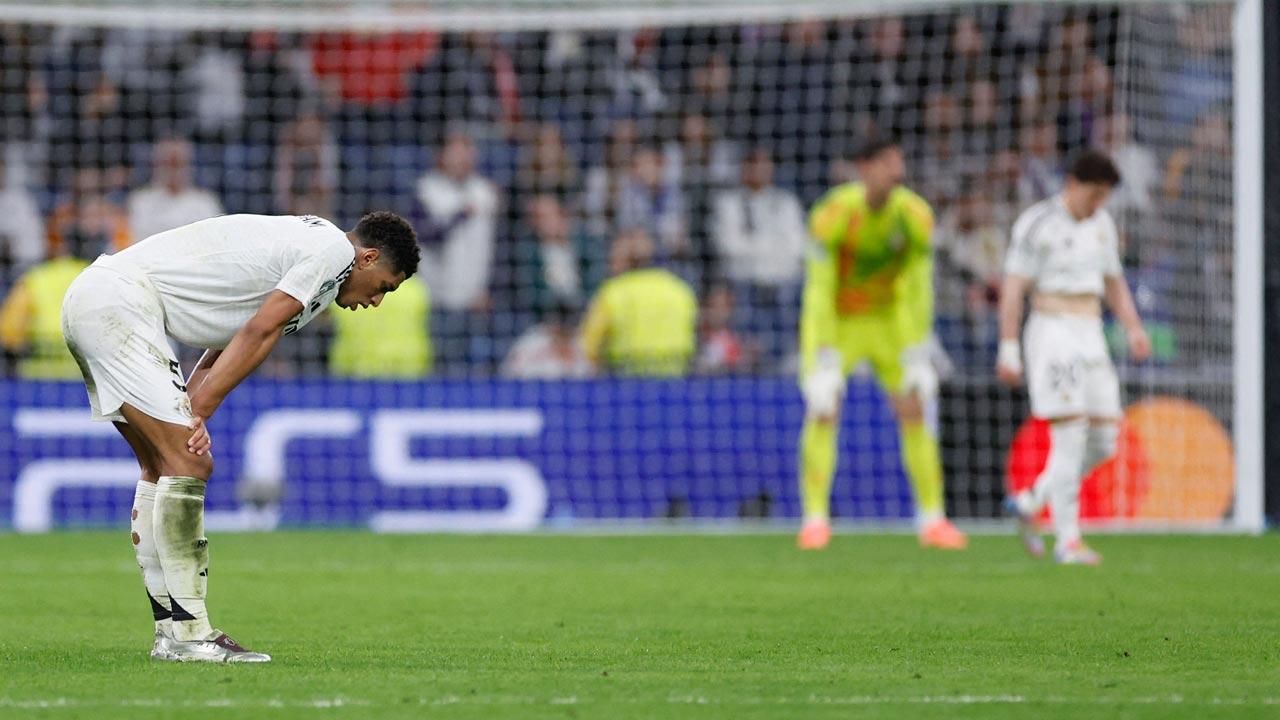Real Madrid`s English midfielder Jude Bellingham reacts to Arsenal`s second goal during the UEFA Champions League quarter final second leg football match between Real Madrid CF and Arsenal at Santiago Bernabeu Stadium in Madrid. Pic/AFP