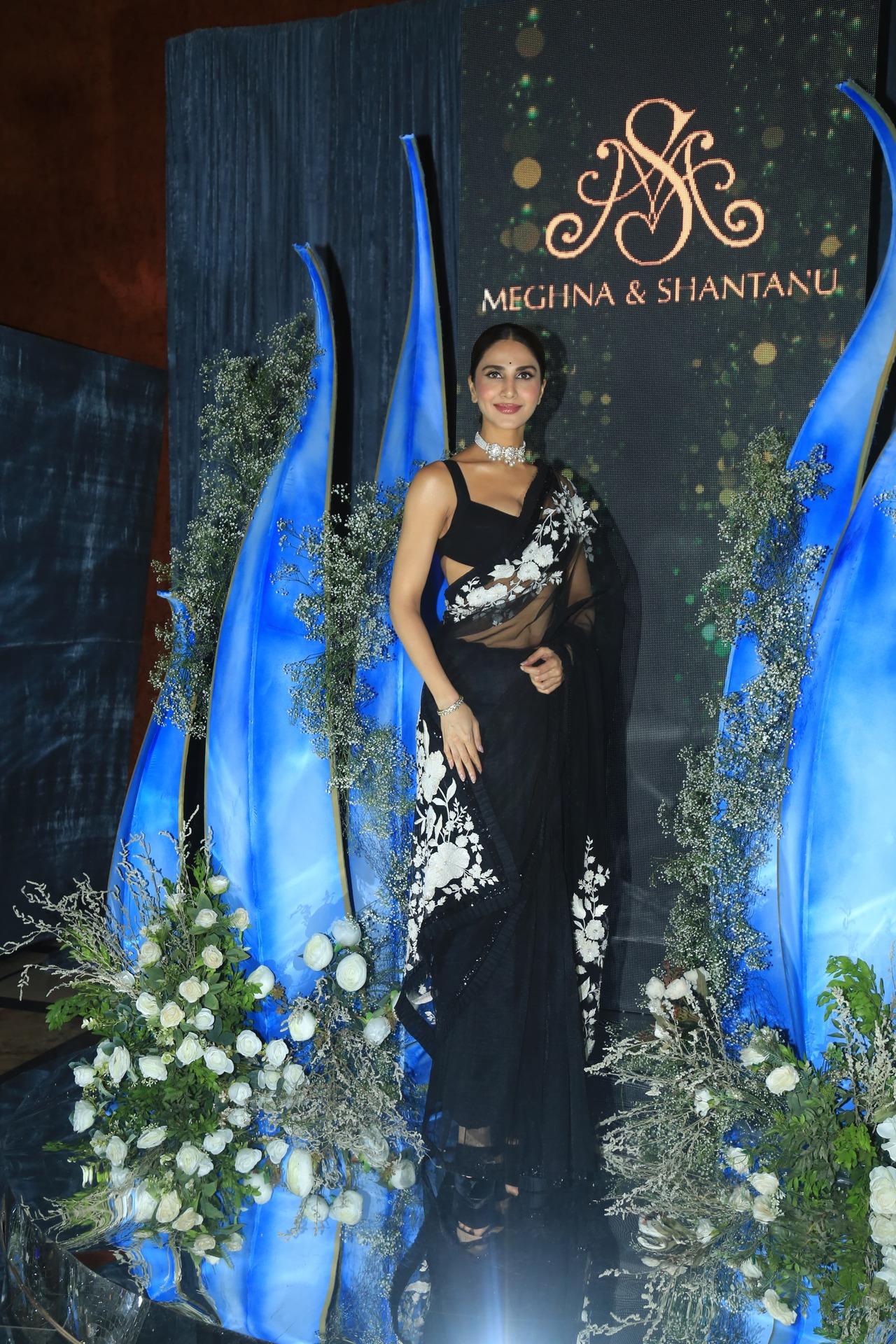 Vaani Kapoor looked classy in this sheer black saree with a hair updo