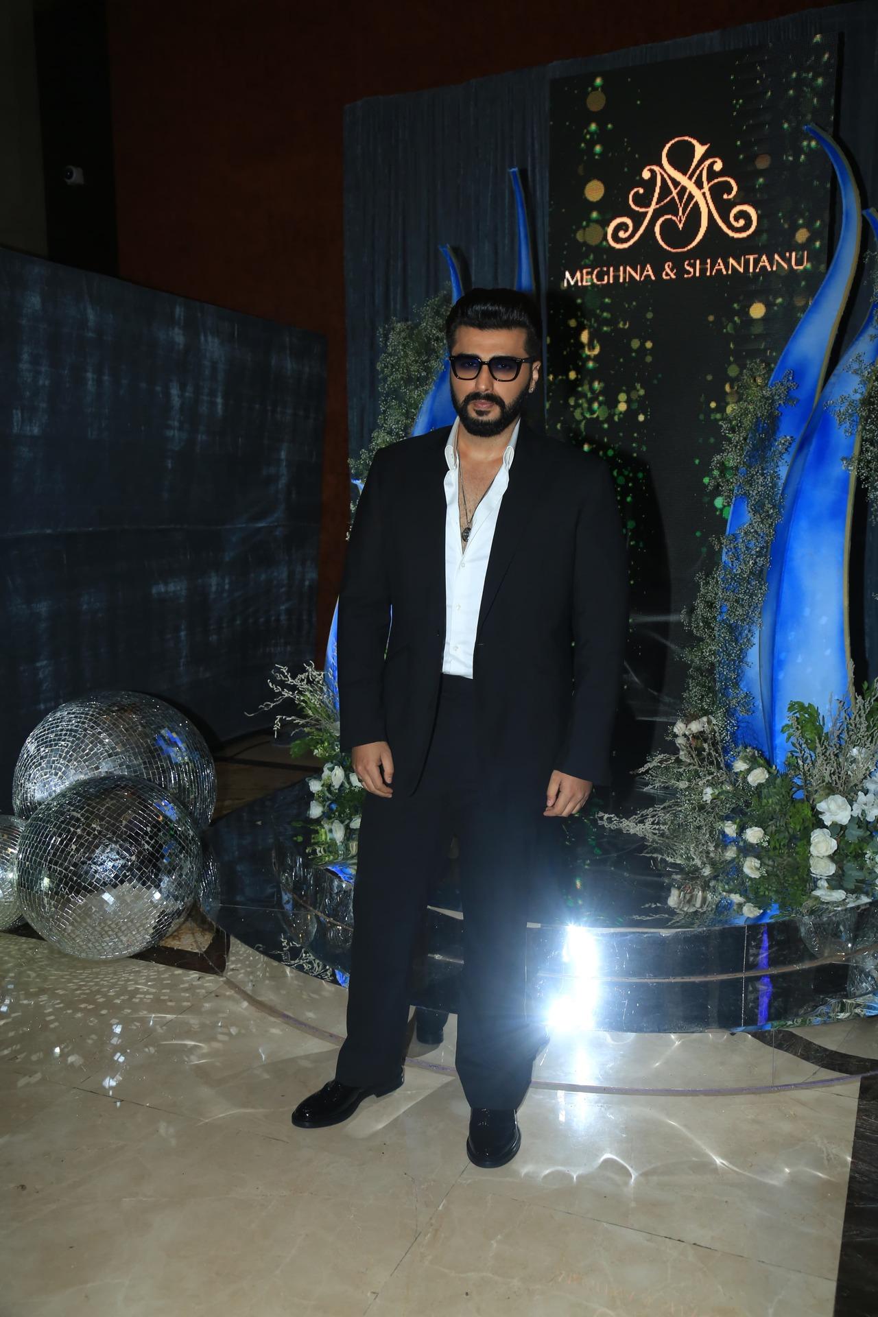 Arjun Kapoor looked stylish in a black suit along with shades