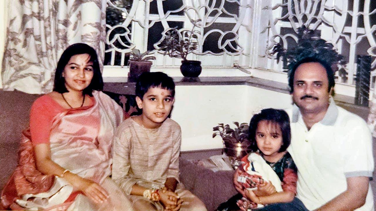Pushkar Shah with his parents and sister at home, 1992