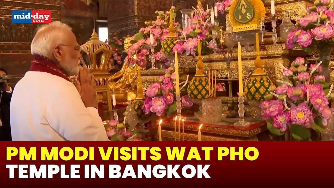 PM Modi in Bangkok lights candle at famous Wat Pho temple