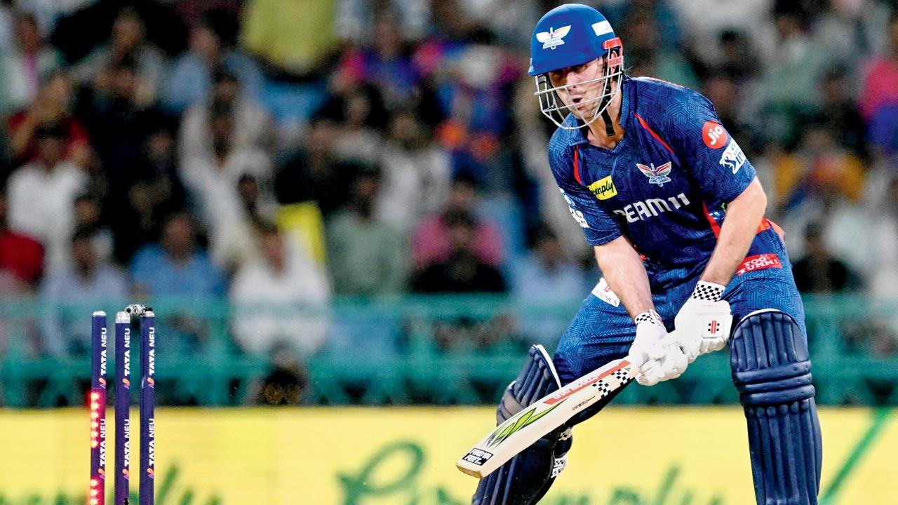  LSG’s Mitchell Marsh is clean bowled by DC’s Mukesh Kumar yesterday