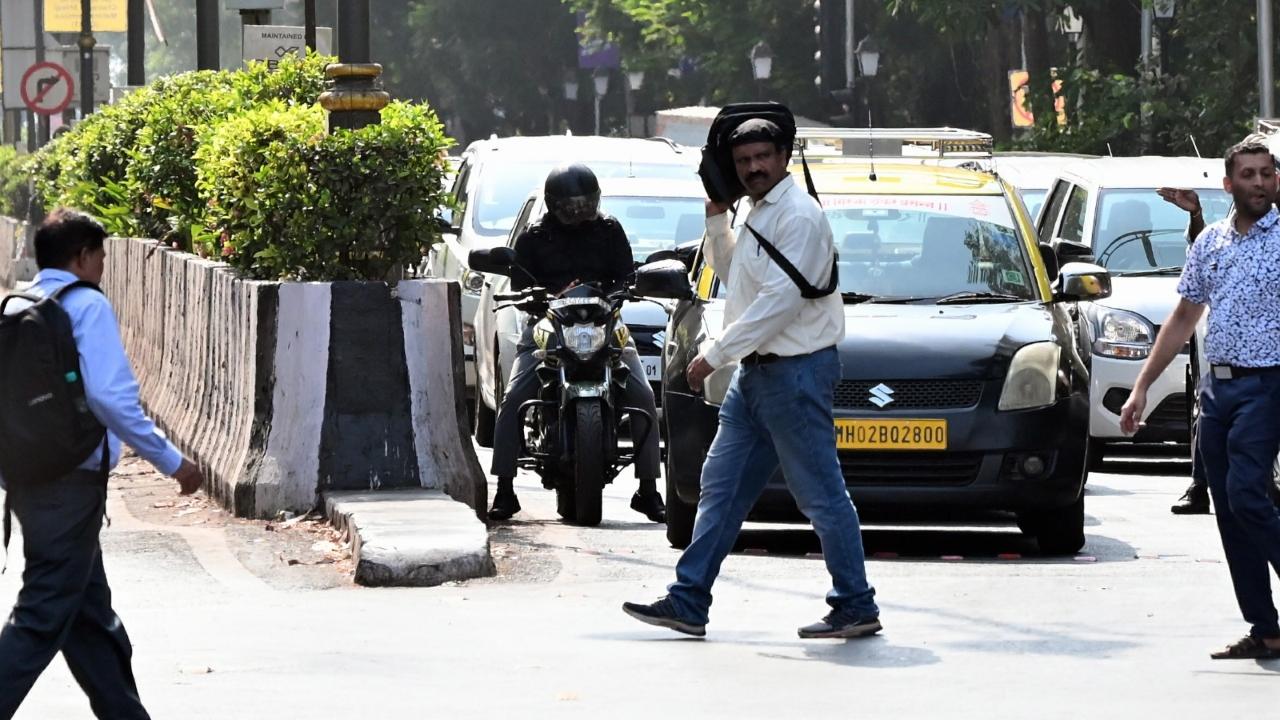 Many people were on Monday seen shielding themselves with newspapers and handkerchiefs