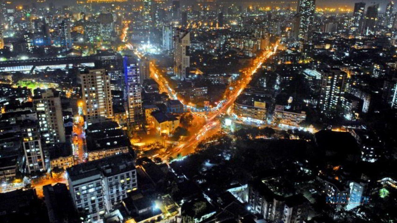 As the sun sets, Mumbai comes alive with dazzling lights, swift motion and a skyline that reaches for the stars